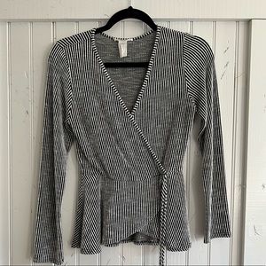 Black and white striped long sleeve shirt with tie at waist